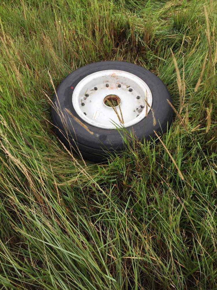The nose wheels distributed across runway