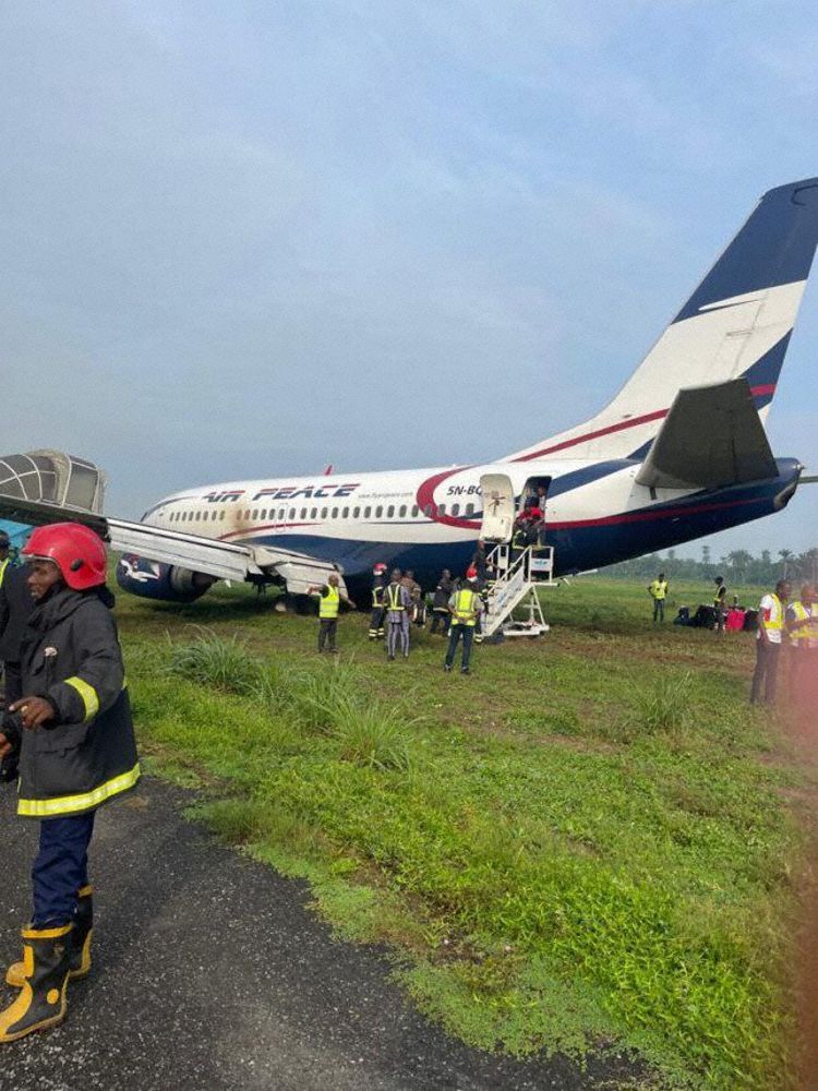 The aircraft on soft ground past the runway end